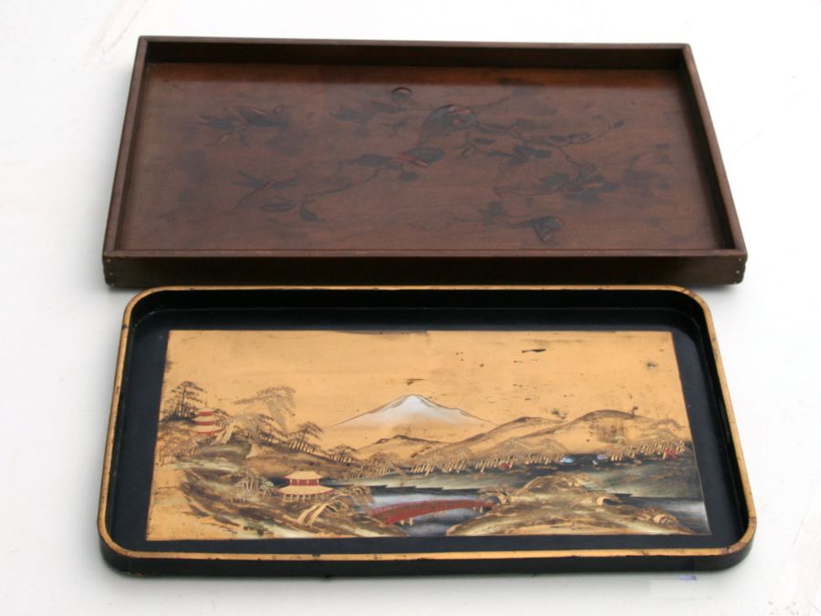 A Japanese black lacquer and gilt tray decorated with a mountainous landscape scene, 60cms wide; - Image 3 of 3
