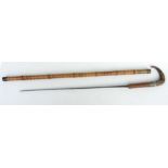 A bamboo sword stick with 54.5cms (21.5ins) square section steel blade with makers name GLISCA and