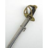 A 19th century French officers light cavalry sword. The slightly curved blade 89cms (35 ins) long