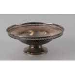 A Walker & Hall silver pedestal bowl with pierced gallery, Sheffield 1925, 17cms diameter, 184g.