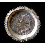 An Indian Goa mother of pearl plate, 20cms diamter.