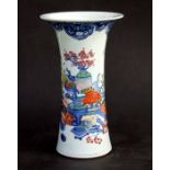 A Chinese famille rose vase of flared cylindrical form decorated with precious objects, six