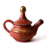 A Turkish Tophane coffee pot with gilded decoration, 15cms high.