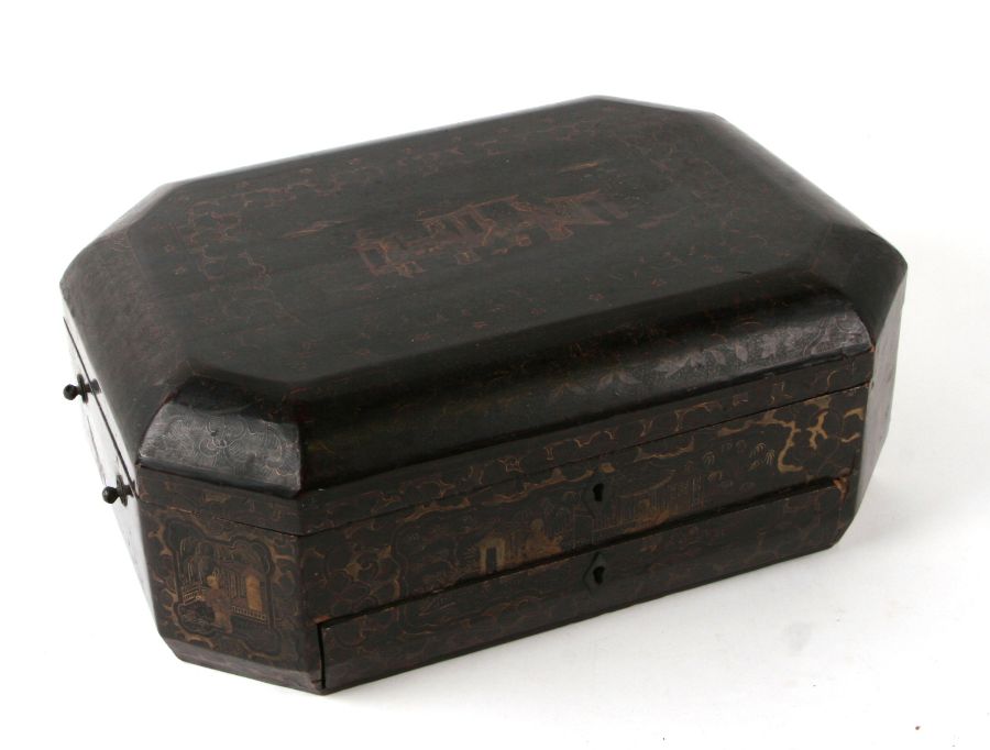 A 19th century Chinese lacquer sewing box of elongated octagonal form with fitted interior