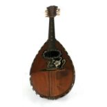 A Mazzoleti Napoli mandolin, 59cms long, in original cloth case.