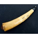 A 19th century ivory powder flask decorated with two deer, with hardwood stopper, 34cms long.