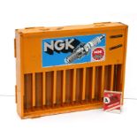 An NGK Spark Plugs point of sale metal display cabinet.