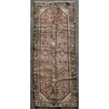 A Persian Hamadan woollen hand knotted runner, 300 by 100cms (375).