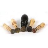 A group of 19th century desk seals with bone, ivory and turned wooden handles, the largest 6cms