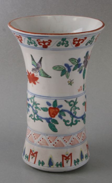 A Chinese Ducai style sleeve vase decorated with birds, flowers and bamboo, six character blue