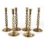 Three pairs of brass open twist candlesticks, the largest 30cms high.