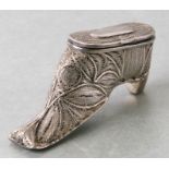A white metal filigree vesta case in the form of a shoe, 6cms wide.Condition ReportGood overall
