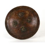 A 19th century Sikh dal / Indian elephant hide shield, 32cms diameter.Condition Reportvendor
