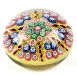A Clichy style millefiori paperweight, 8cms diameter.Condition Reportgood overall condition no