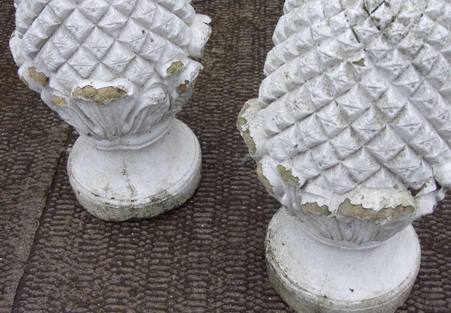 A pair of well weathered painted reconstituted stone pineapple finials, 60cms high (2). - Image 2 of 3