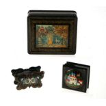 A Russian lacquer box decorated with a woman with a deer, on a black ground with red interior, 13cms