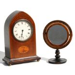 An Edwardian mahogany lancet shaped mantle clock with inlaid decoration, 15cms wide; together with a