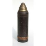 An inert WW1 artillery shell and fuze in two parts. The brass fuze date 1916. Having a diameter of