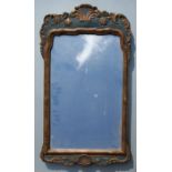 A gilt gesso wall mirror, overall 40 by 71cms.