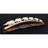 An early 20th century carved ivory chain of elephants. 43cm long