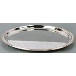 A large Christofle circular silver plated tray with beaded border, 39cms diameter.
