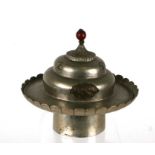 A Eastern silver coloured metal incense burner and cover, 12cms diameter.