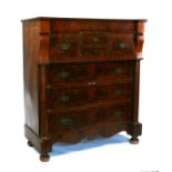 A large 19th century figured mahogany Scottish chest with an arrangement of four drawers above three