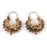 A pair of ornate 9ct gold hoop earrings, 2g.