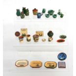 A quantity of miniature doll's house ceramics to include Watcombe Motto ware and Rye Pottery items.