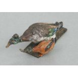 A cold painted bronze group depicting two ducks, 8cms wide.