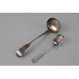 An early 19th century Scottish silver sauce ladle, Edinburgh 1823,; together with a silver sugar