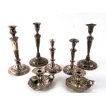 A pair of Sheffield plate Adam style candlesticks, 29cms high; a pair of silver plated chambersticks