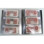 A quantity of English banknotes to include 10 shilling and £1 notes, many uncirculated with