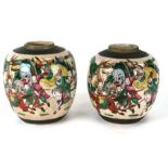 Two Chinese famille rose ginger jars decorated with warriors, one with an incised four-character