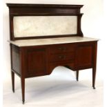 An Edwardian mahogany washstand with marble top and splashback, 122cms wide.