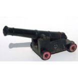 A 19th century signal cannon. Having a cast iron barrel 49cms (19.25ins) with the vent hole being