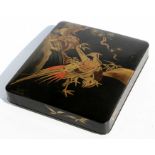 A Japanese Meiji period black lacquer and chinoiserie decorated writing box, the cover decorated