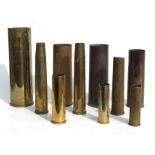 Ten mainly WW2 brass artillery shell cases. The largest being dated 1944 and standing 37cms (14.