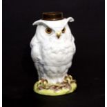 A late 19th / early 20th century French porcelain night light modelled as an owl, retailed by