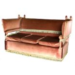 A pink upholstered Knoll sofa, 170cms wide.
