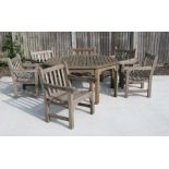 A harlequin set of three Lister and three Britannic teak garden chairs with similar octagonal table,