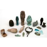 A group of Egyptian antiquities and later items to include Scarab beetle, Shabti figures and