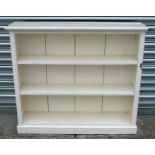 A painted pine open bookcase, 108cms wide.