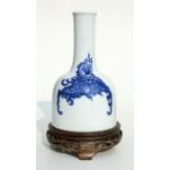 A Chinese blue & white vase of mallet form, six character blue mark to the underside, on a