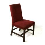 A Georgian mahogany chair with upholstered seat and back on square chamfered legs.