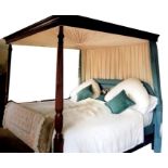 A king size mahogany four-poster bed with silk canopy.Condition ReportThe bed was dismantled to