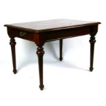 A continental mahogany centre table on faceted tapering legs with single end drawer, 107cms wide.
