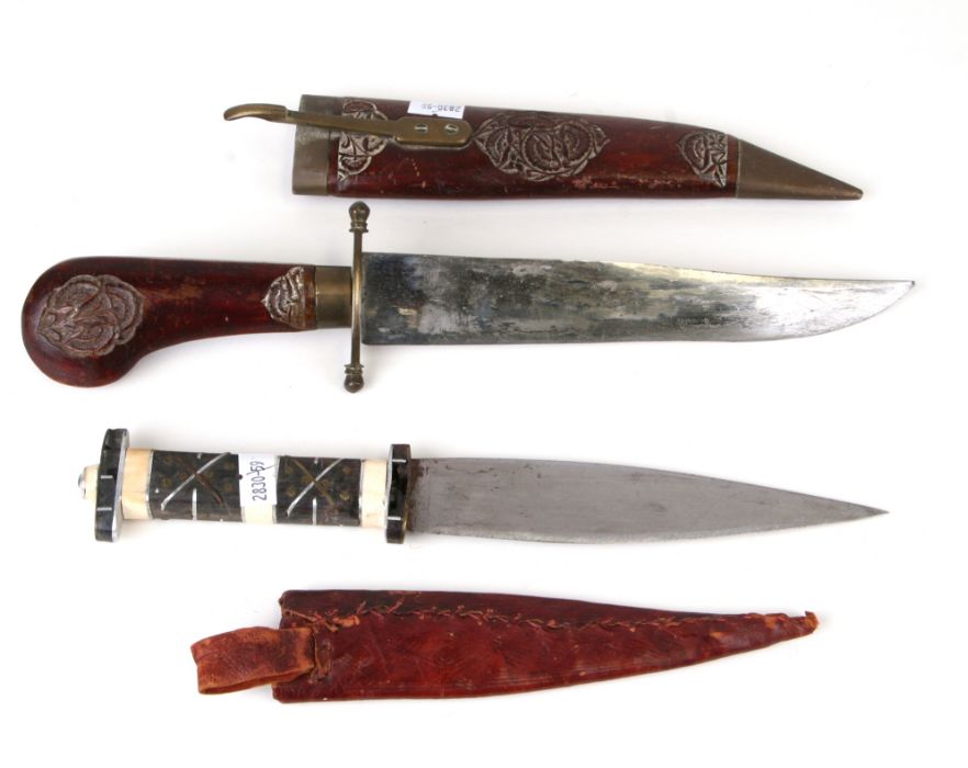 An Iznik style dagger with bone handle and leather sheath, 30cms long; together with another similar - Image 2 of 2