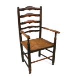 A North country ladderback elbow chair.