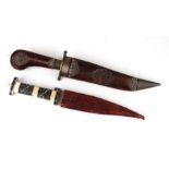 An Iznik style dagger with bone handle and leather sheath, 30cms long; together with another similar